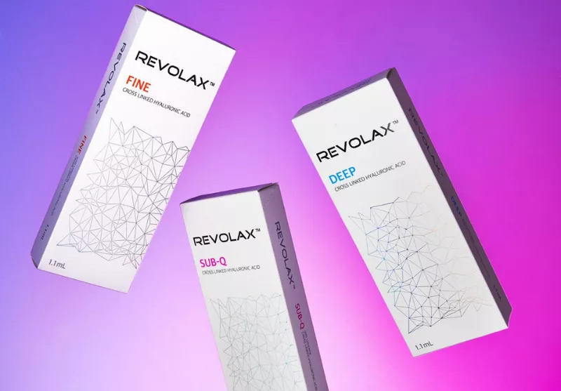 REVOLAX complete lidocaine dermal filler range on a pink and purple background